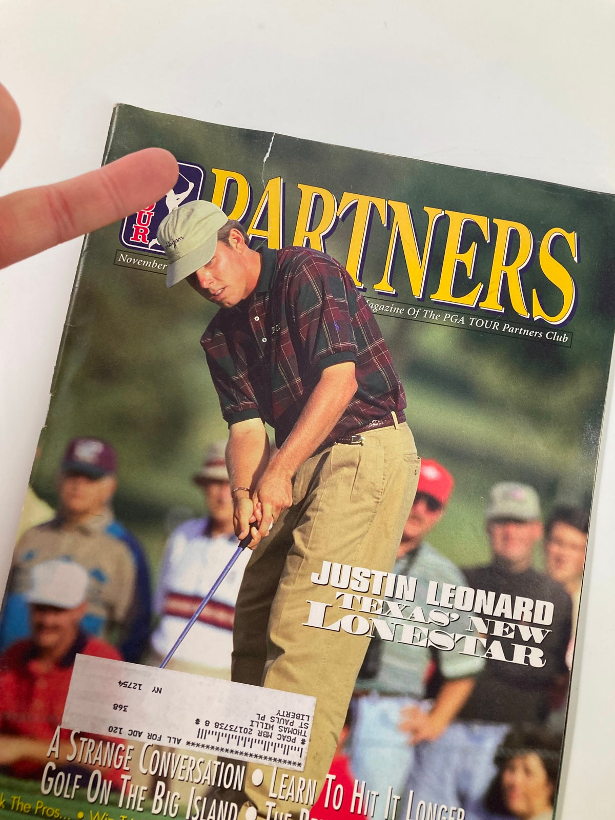 Close-up of the cover of PGA Tour Partners Magazine, November 1997, highlighting Justin Leonard's article titled Texas' New Lonestar.