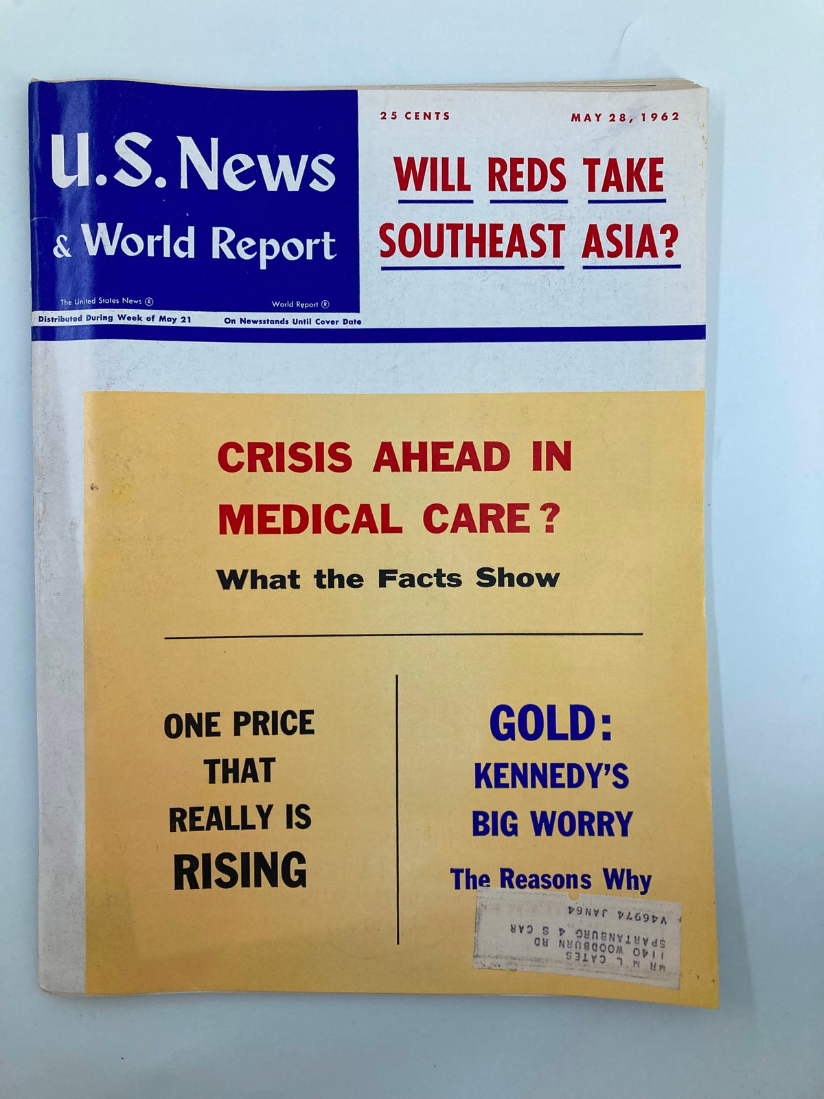 Cover of US News & World Report Magazine from May 28, 1962, featuring the title 'Will Reds Take Southeast Asia?' Highlights include 'Crisis Ahead in Medical Care?' and 'Gold: Kennedy's Big Worry' with eye-catching graphics and bold text.