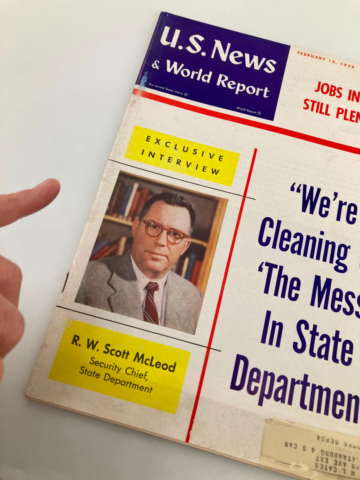 Cover of US News & World Report Magazine February 12, 1954, featuring an exclusive interview with R. W. Scott McLeod, Security Chief of the State Department, and the headline 'Jobs in U.S. Still Plentiful'.