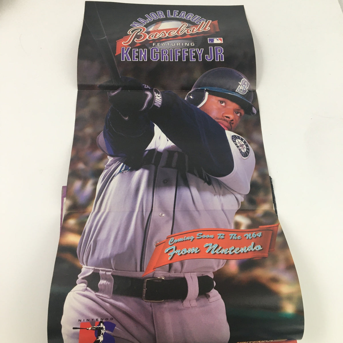 Promotional poster from Nintendo Power Magazine July 1997 featuring Ken Griffey Jr. for Major League Baseball.