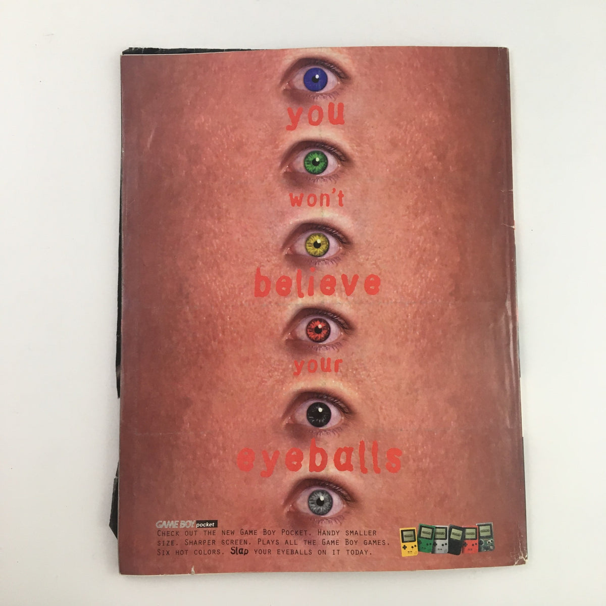Cover of Nintendo Power Magazine from July 1997 featuring the title 'you won't believe your eyeballs' with a striking design of colorful eyes and branding for the Game Boy Pocket, associated with Star Fox 64 & Ken Griffey Jr.