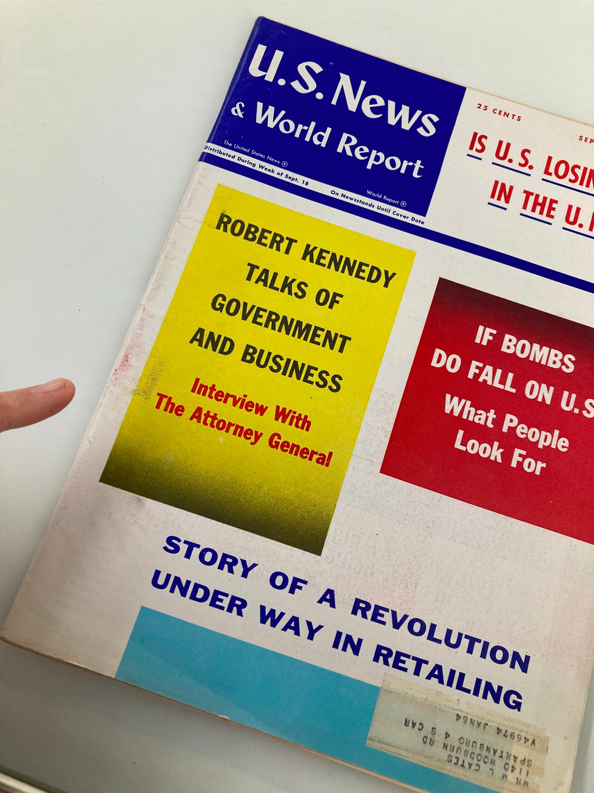 Cover of US News & World Report Magazine dated September 25, 1961, featuring the title 'Robert Kennedy Talks of Government and Business' along with additional headlines discussing U.S. concerns and a revolution in retailing, visually showcasing the political and business landscape of the early 1960s.