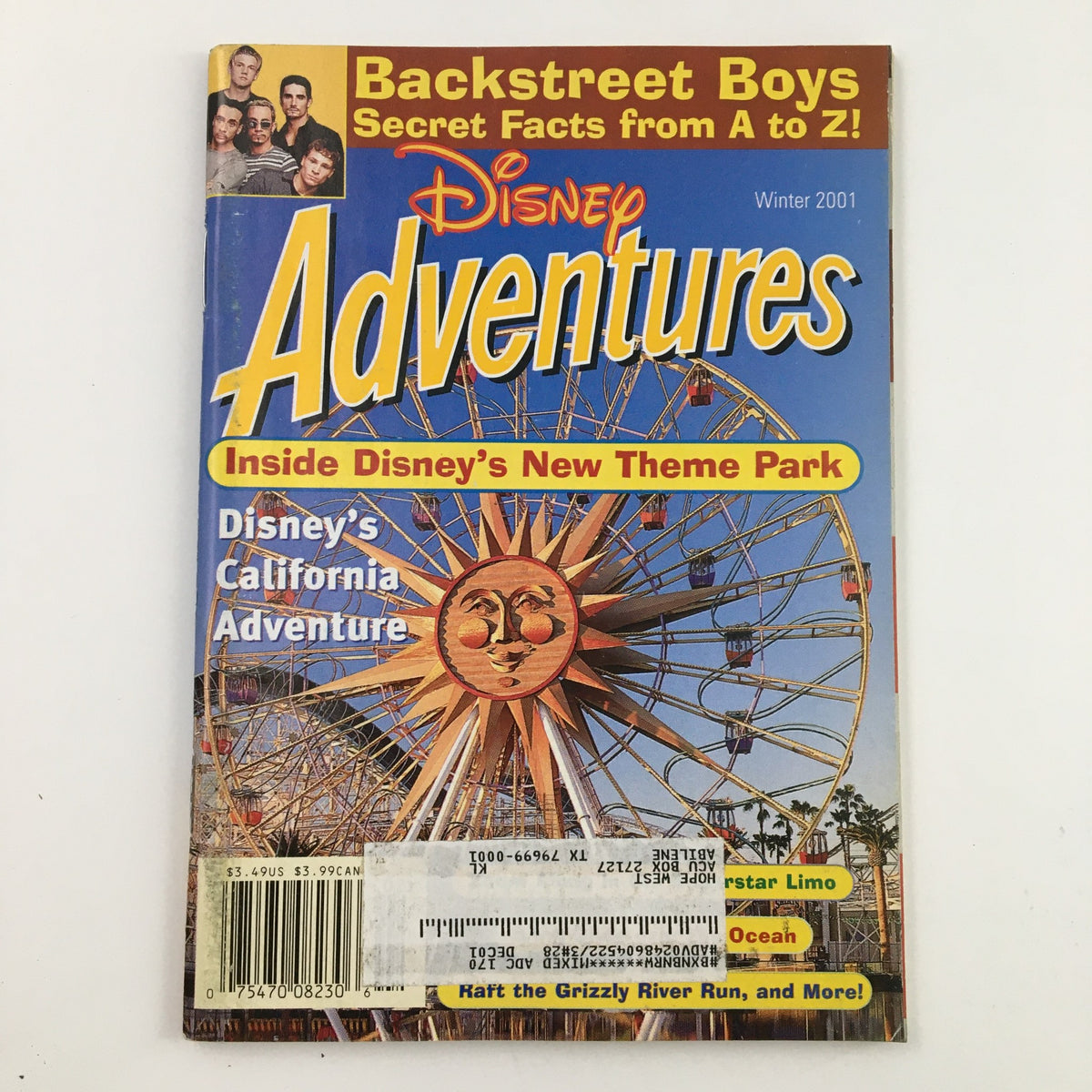 Disney Adventures Magazine Winter 2001 cover featuring Disney's California Adventure theme park, showcasing a vibrant Ferris wheel and fun attractions.