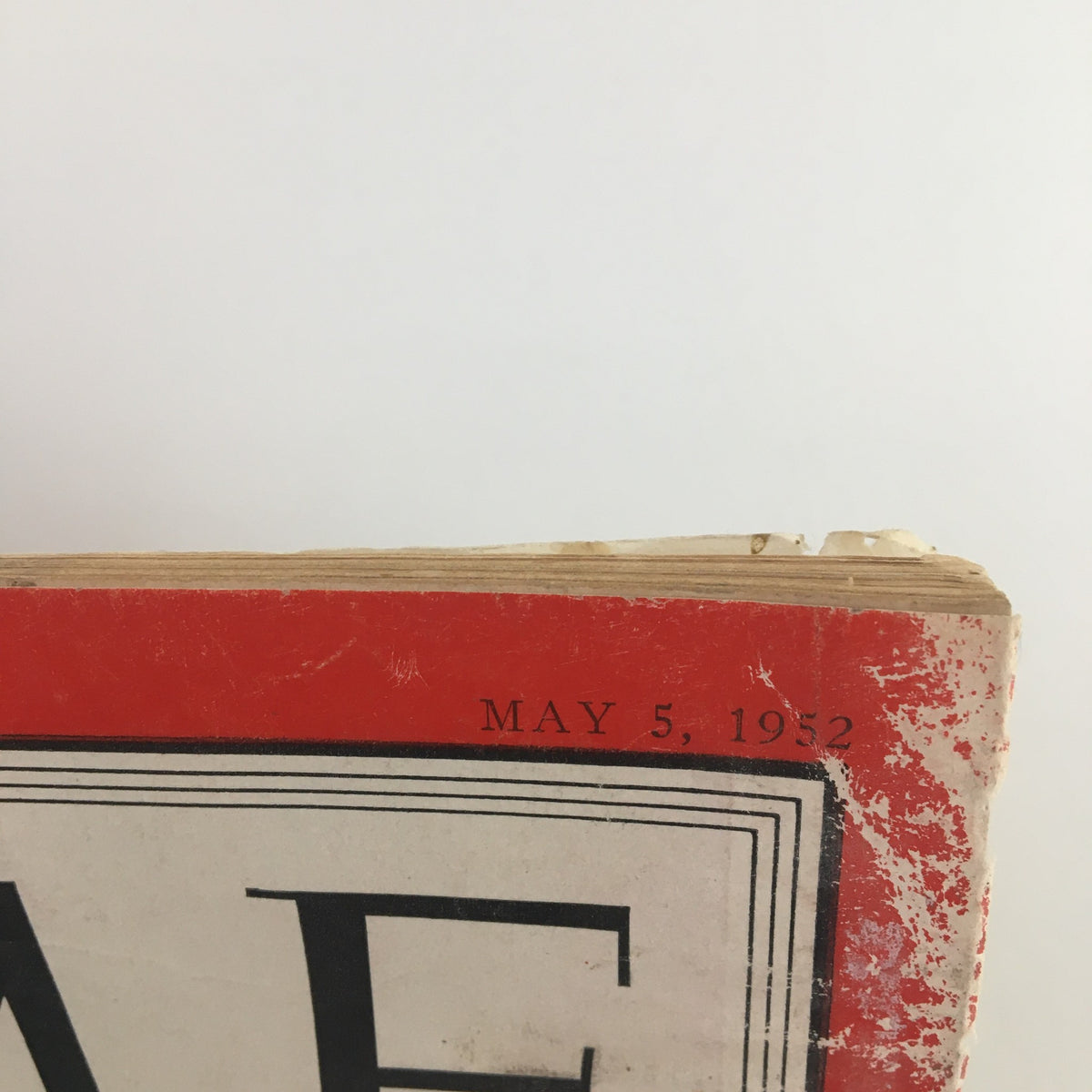 Top view of Time Magazine May 5 1952 Vol LIX No. 18 showing the publication date and wear on the magazine's spine, emphasizing its historical significance.