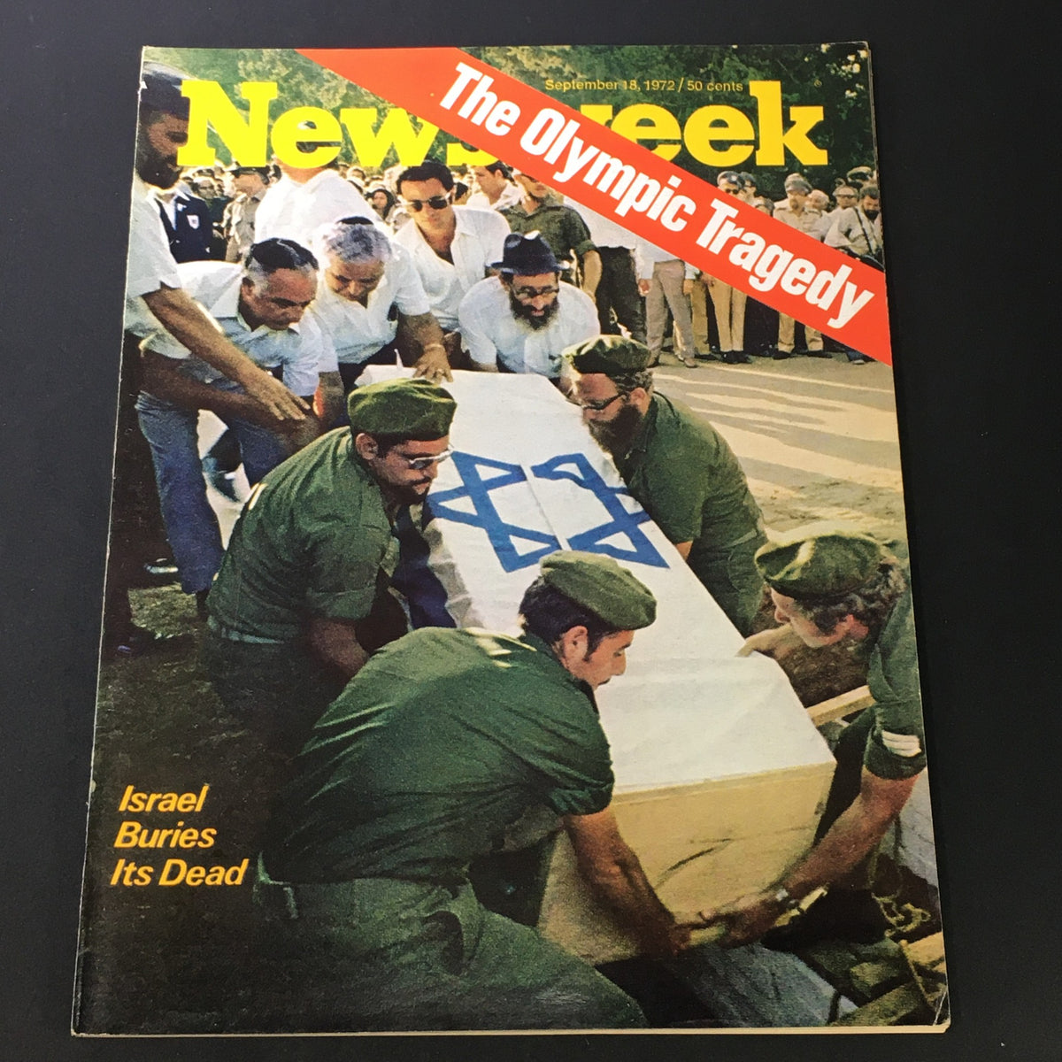 VTG Newsweek Magazine September 18 1972 featuring the Olympic Tragedy story, showing people carrying a coffin with a blue Star of David, highlighting the poignant burial of the dead in Israel.