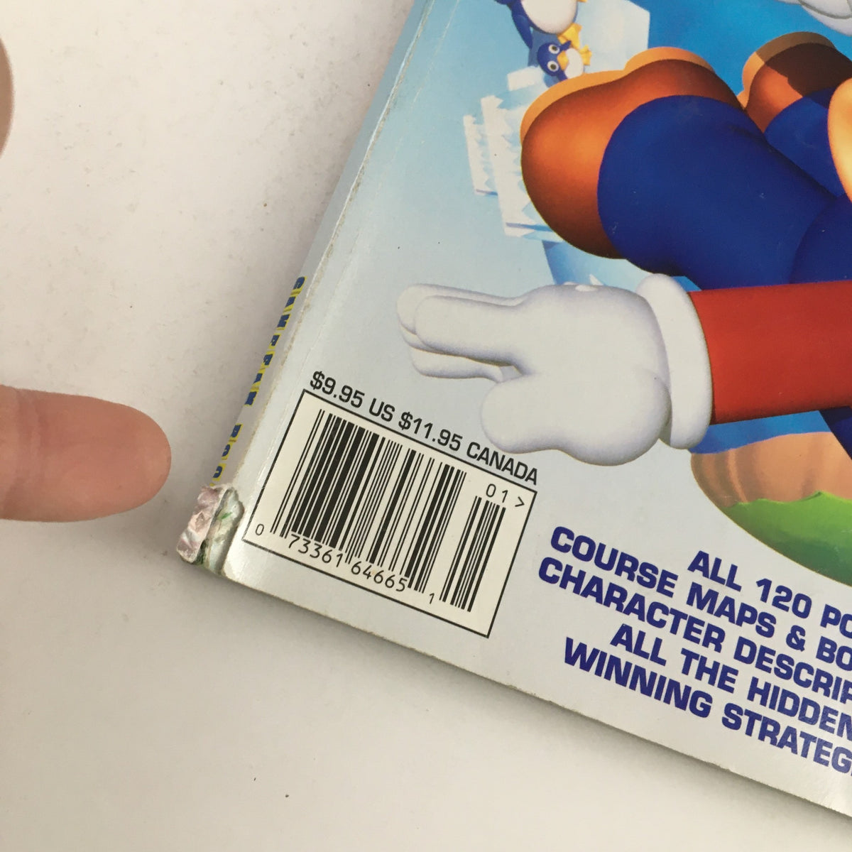 GameFan Books Super Mario 64 Strategy Guide No Label detailed back cover showing price stickers and minor wear, perfect for collectors and vintage gaming enthusiasts.