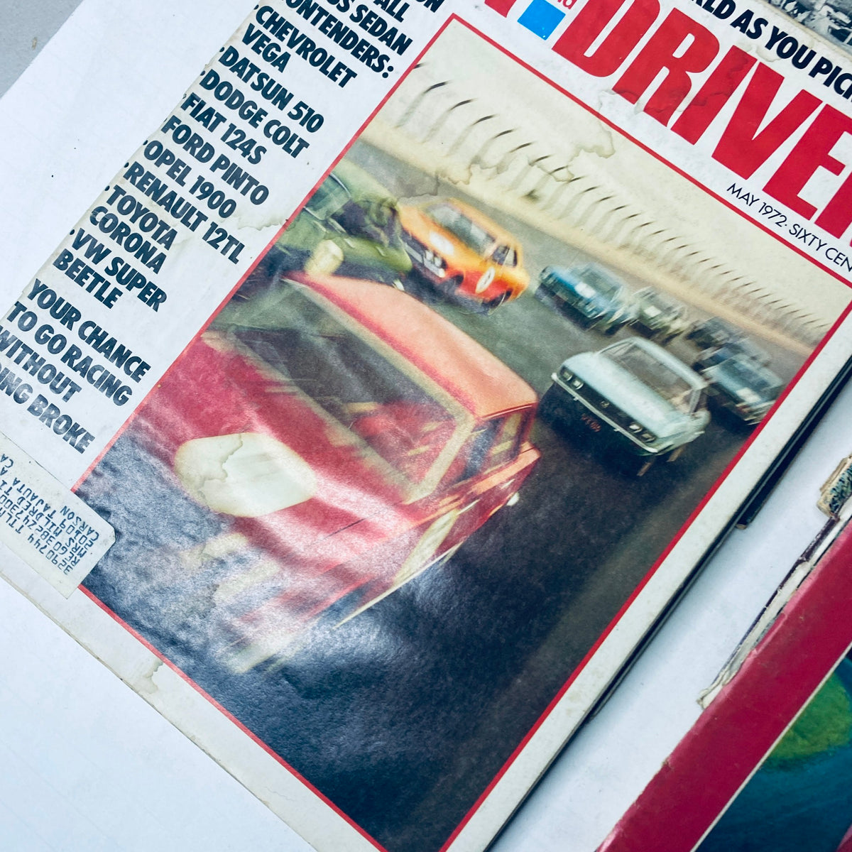 Detailed view of the May 1972 Car and Driver Magazine cover, showcasing classic cars, part of the Lot of 11 Car and Driver Magazine 1972 January - September & December Set.