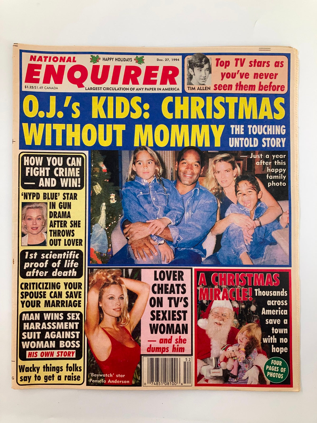 Cover of the National Enquirer Tabloid dated December 27, 1994 featuring headlines about Pamela Anderson, Tim Allen, and O.J. Simpson's kids, along with a Christmas theme. The magazine is in very good condition and comes with a protective covering.