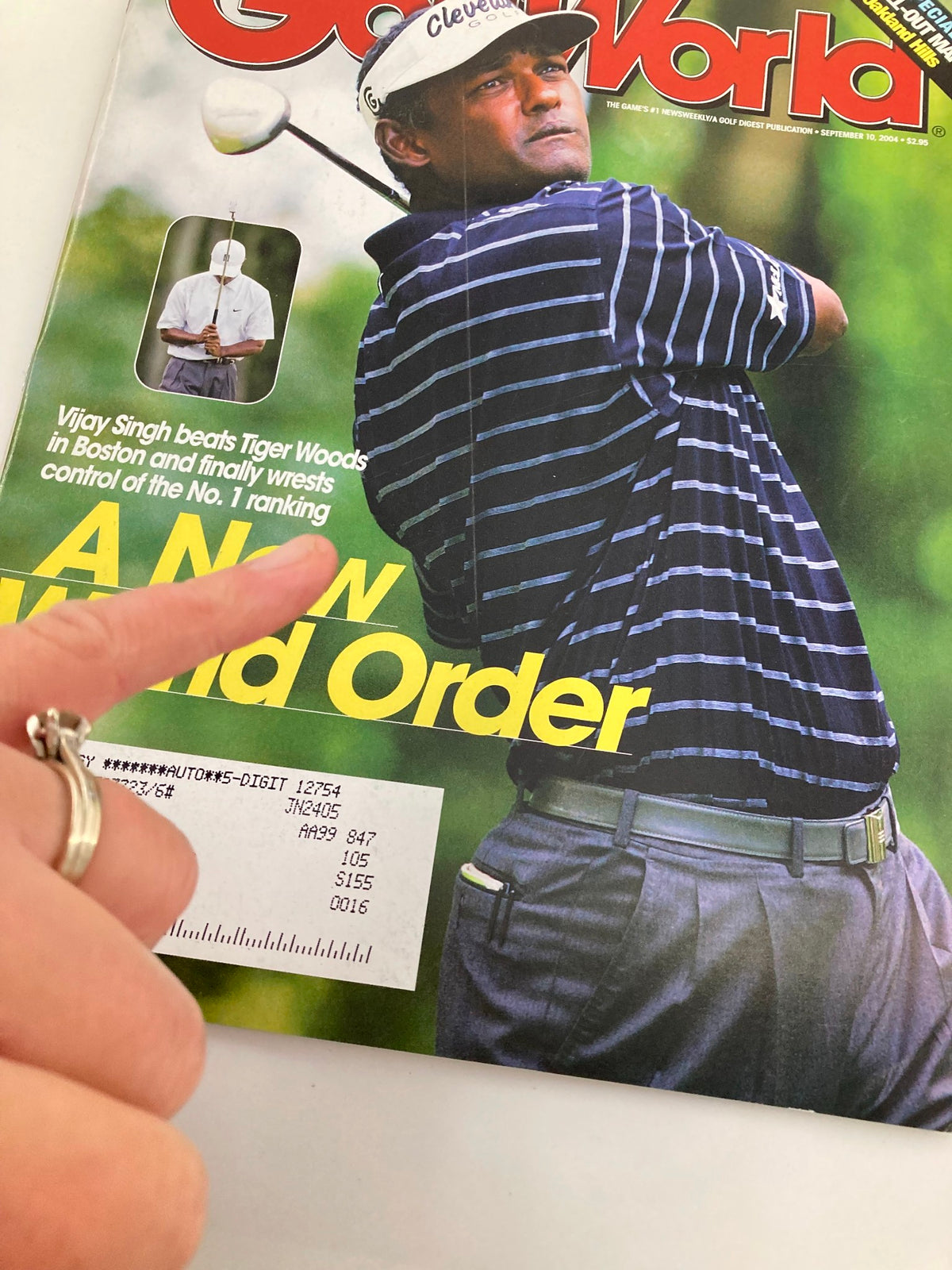 Cover of Golf World Magazine September 10, 2004, featuring Vijay Singh in a navy striped shirt, highlighting the article 'A New World Order' which discusses his rise in professional golf.