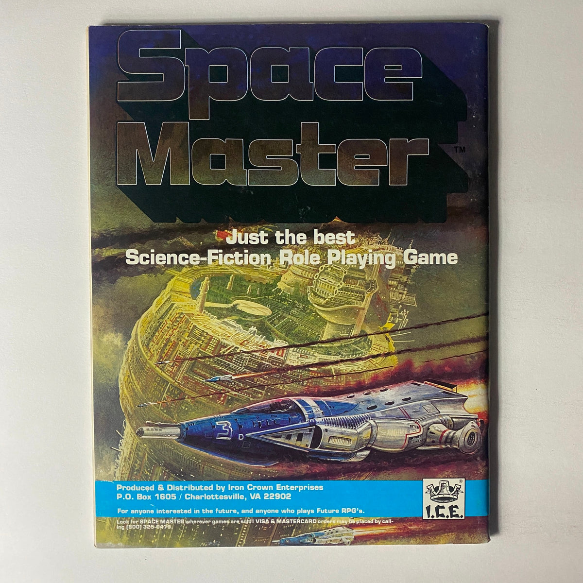 Cover of Space Master role-playing game featuring a futuristic spaceship and a vibrant space landscape. Title: Space Master - Just the best Science-Fiction Role Playing Game. Perfect for collectors of vintage gaming materials.