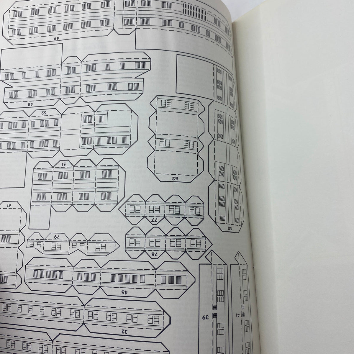Paper model layout found in Dragon Magazine May 1987 #121, intended for use in tabletop role-playing adventures.