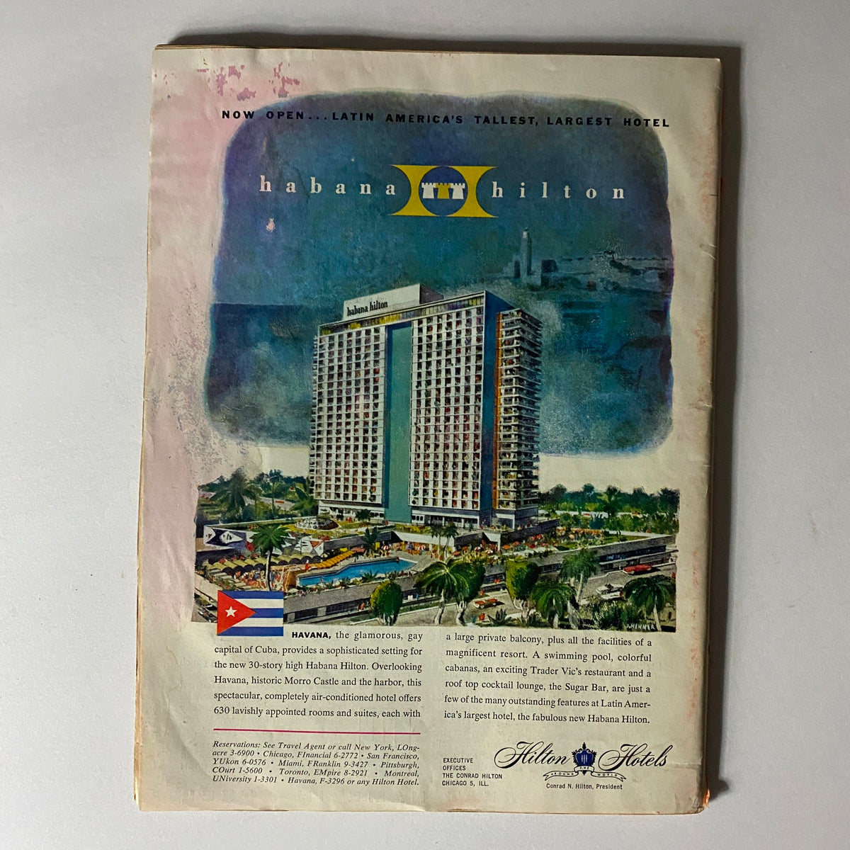 VTG Time Magazine March 31 1958 featuring an advertisement for the Habana Hilton, Latin America's tallest hotel, showcasing the hotel building and lush surroundings.