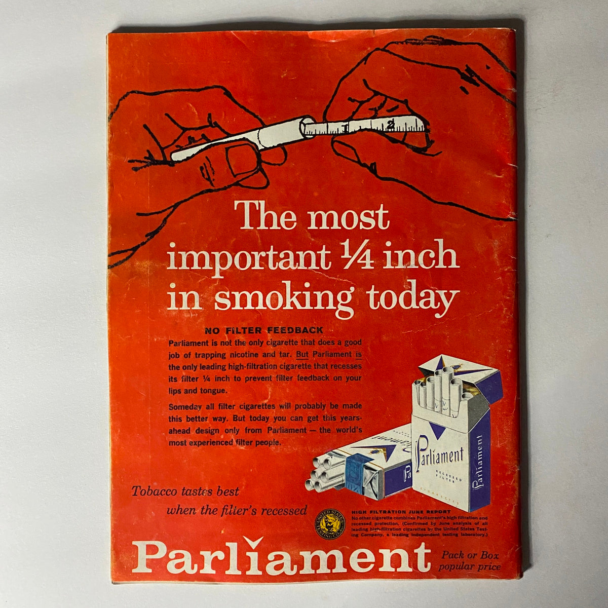 Vintage advertisement for Parliament cigarettes emphasizing the importance of filter design, presented with bold text on an orange background.