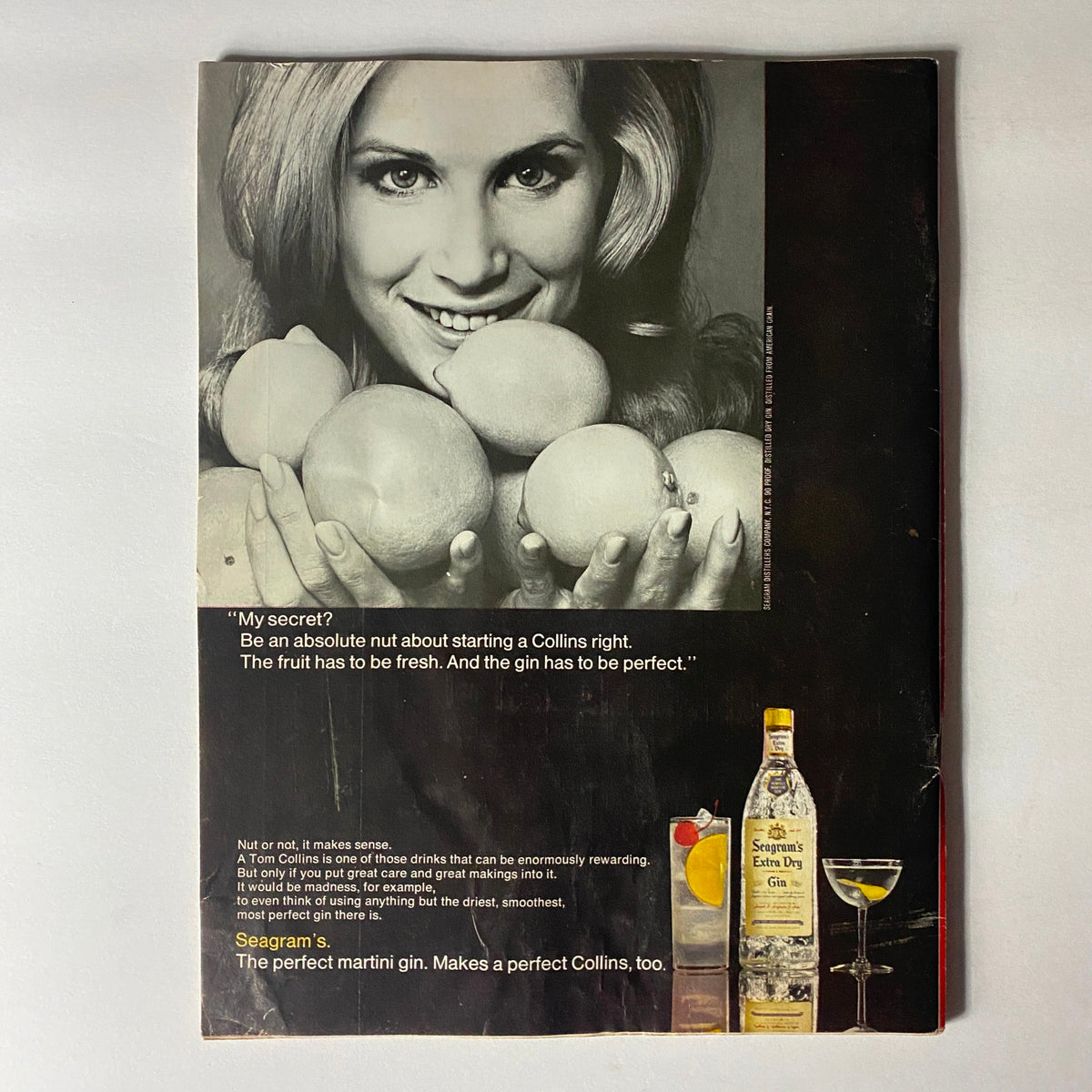 Back cover of the VTG Time Magazine August 1, 1969 featuring a vintage Seagram's gin advertisement with a woman holding oranges and a classic cocktail.