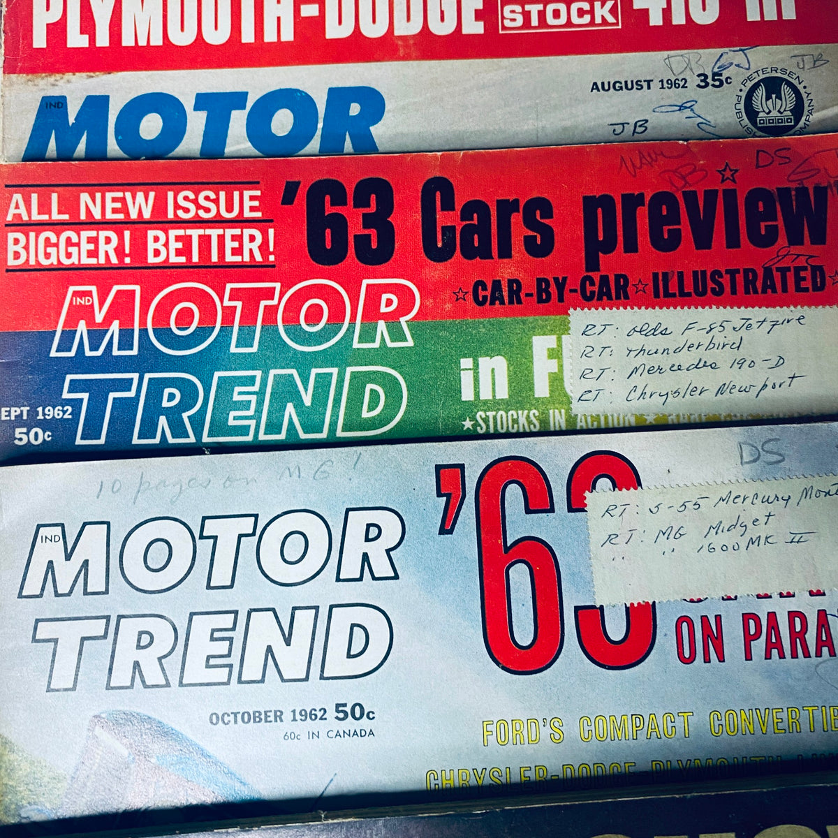 Lot of 11 Motor Trend Magazine covers from 1962, showcasing the August issue previewing '63 cars with highlights of the Plymouth-Dodge and Chrysler vehicles.