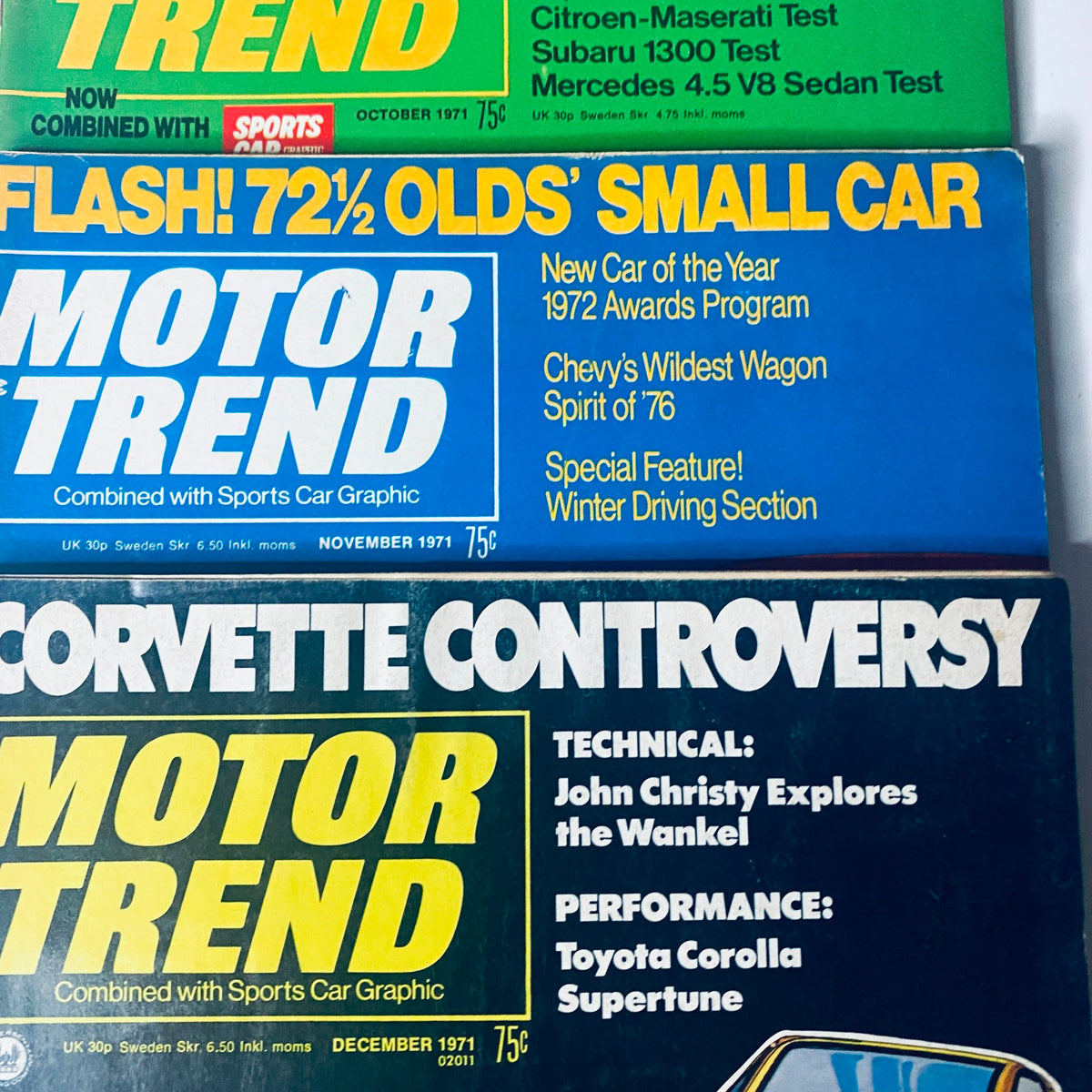 September to December 1971 issues of Motor Trend Magazine, highlighting topics like the 1972 Oldsmobile and Corvette Controversy as part of the Lot of 6 Motor Trend Magazines.
