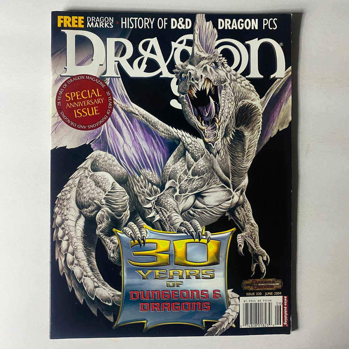 Dragon Magazine June 2004 Issue #320 with Wayne Reynolds' cover illustration, highlighting the special anniversary issue commemorating 30 years of Dungeons & Dragons.