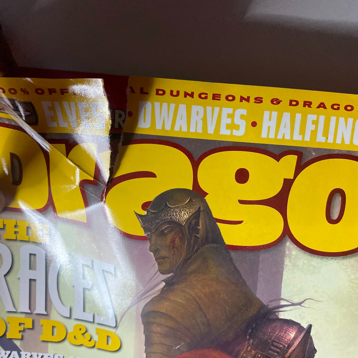 Cover of Dragon Magazine February 2005 #328 showcasing a fantasy character, representing the Races of D&D with vibrant colors and intricate artwork.
