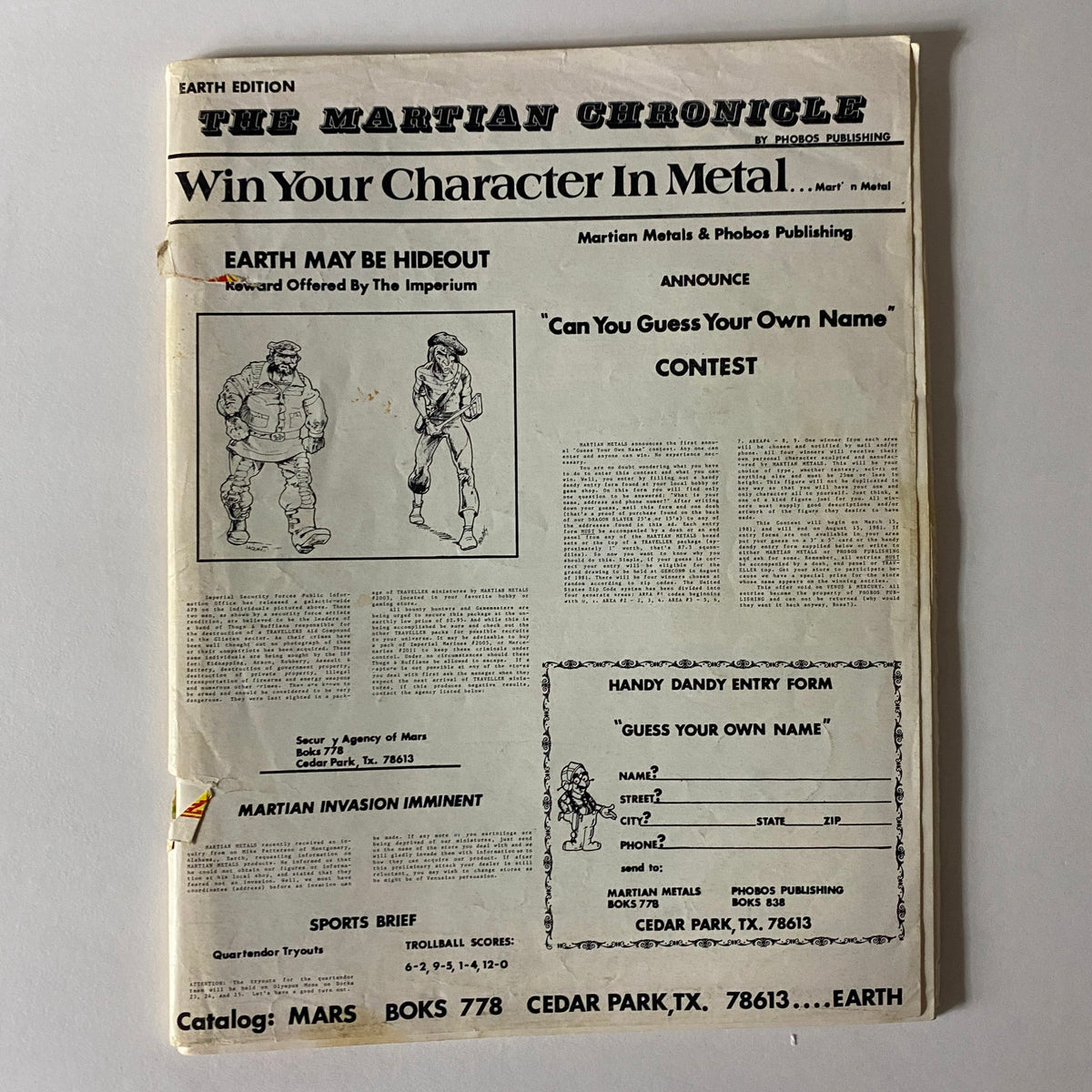 Cover of The Martian Chronicle Earth Edition featuring an announcement for a character contest by Martian Metals & Phobos Publishing. The design includes illustrations and articles related to gaming, with a section about a Martian invasion imminent. Perfect for collectors of vintage gaming magazines.