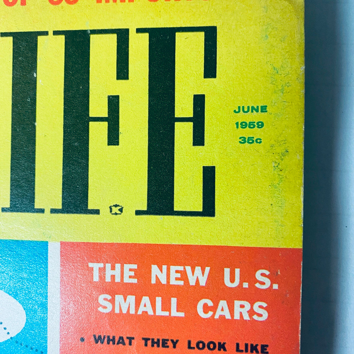 Lot of 8 Car Life Magazine cover from June 1959, highlighting new U.S. small cars with vibrant graphics and engaging headlines.