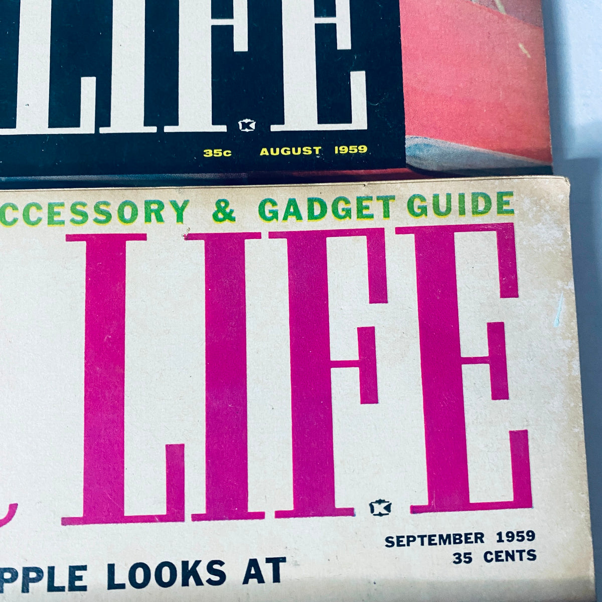 Lot of 8 Car Life Magazine covers from September 1959 and August 1959, displaying bold typography and automotive features.