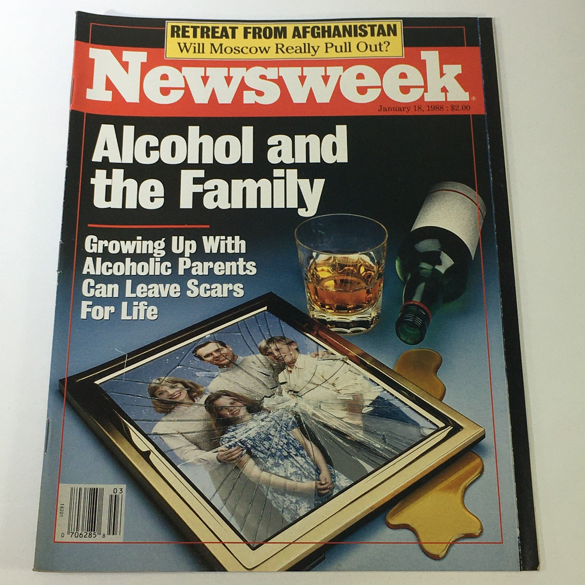 Cover of VTG Newsweek Magazine January 18 1988 featuring the title 'Alcohol and the Family' with an image of a shattered family photograph, a glass of whiskey, and a bottle, highlighting the impact of alcohol on family dynamics.