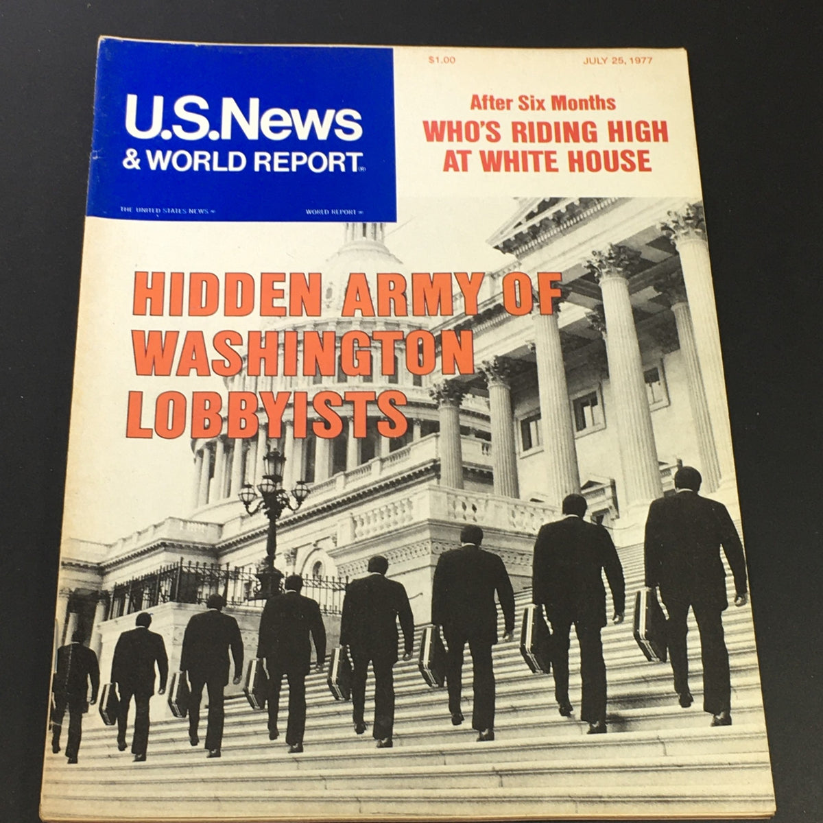 Vintage US News & World Report magazine cover from July 25, 1977 featuring the article 'Hidden Army of Washington Lobbyists'. The cover showcases silhouetted figures in suits carrying briefcases, walking up the steps of a governmental building.