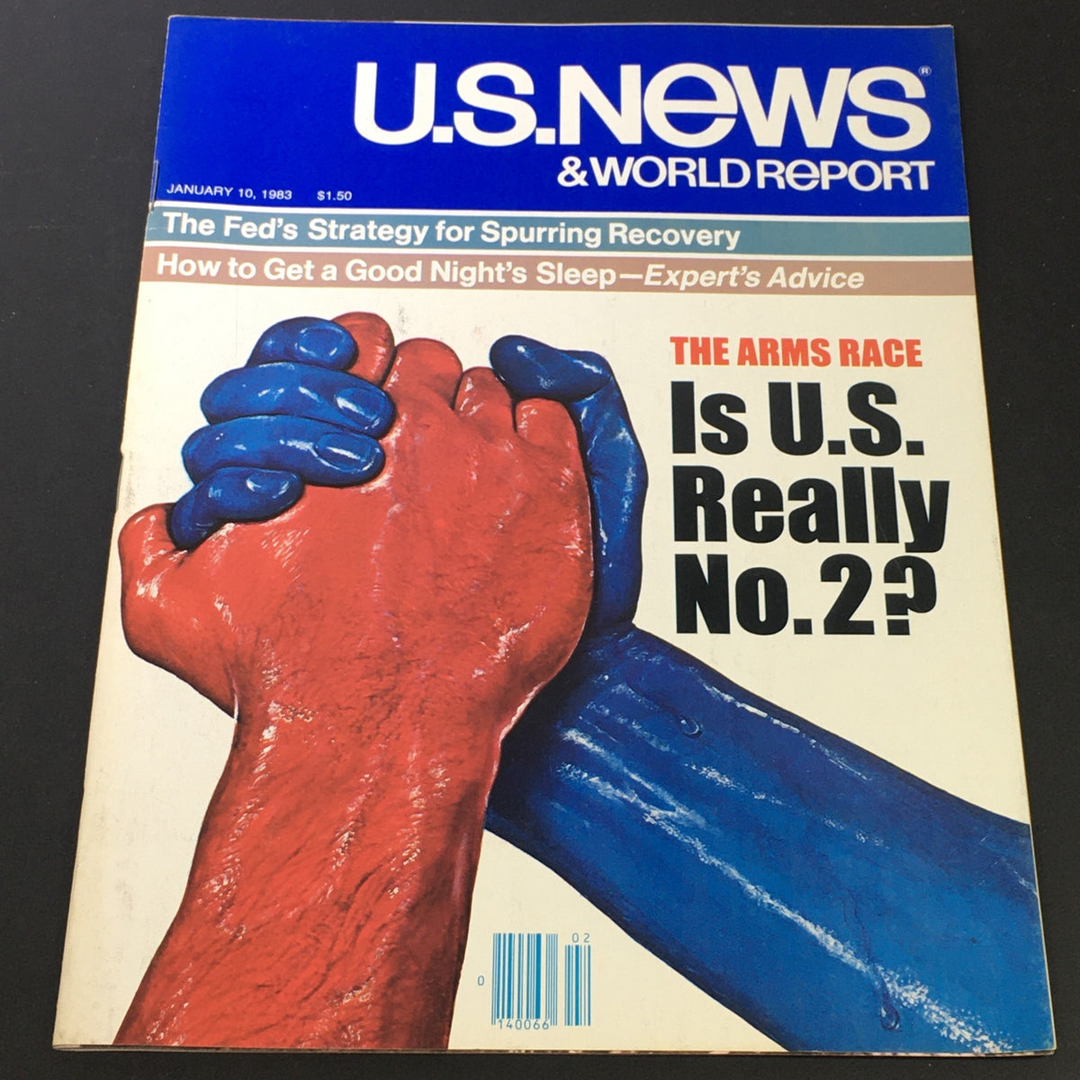 Vintage US News & World Report cover from January 10, 1983, featuring a striking image of red and blue hands clasped together. The cover highlights the Federal strategy for spurring economic recovery and includes articles on the arms race and advice for better sleep.