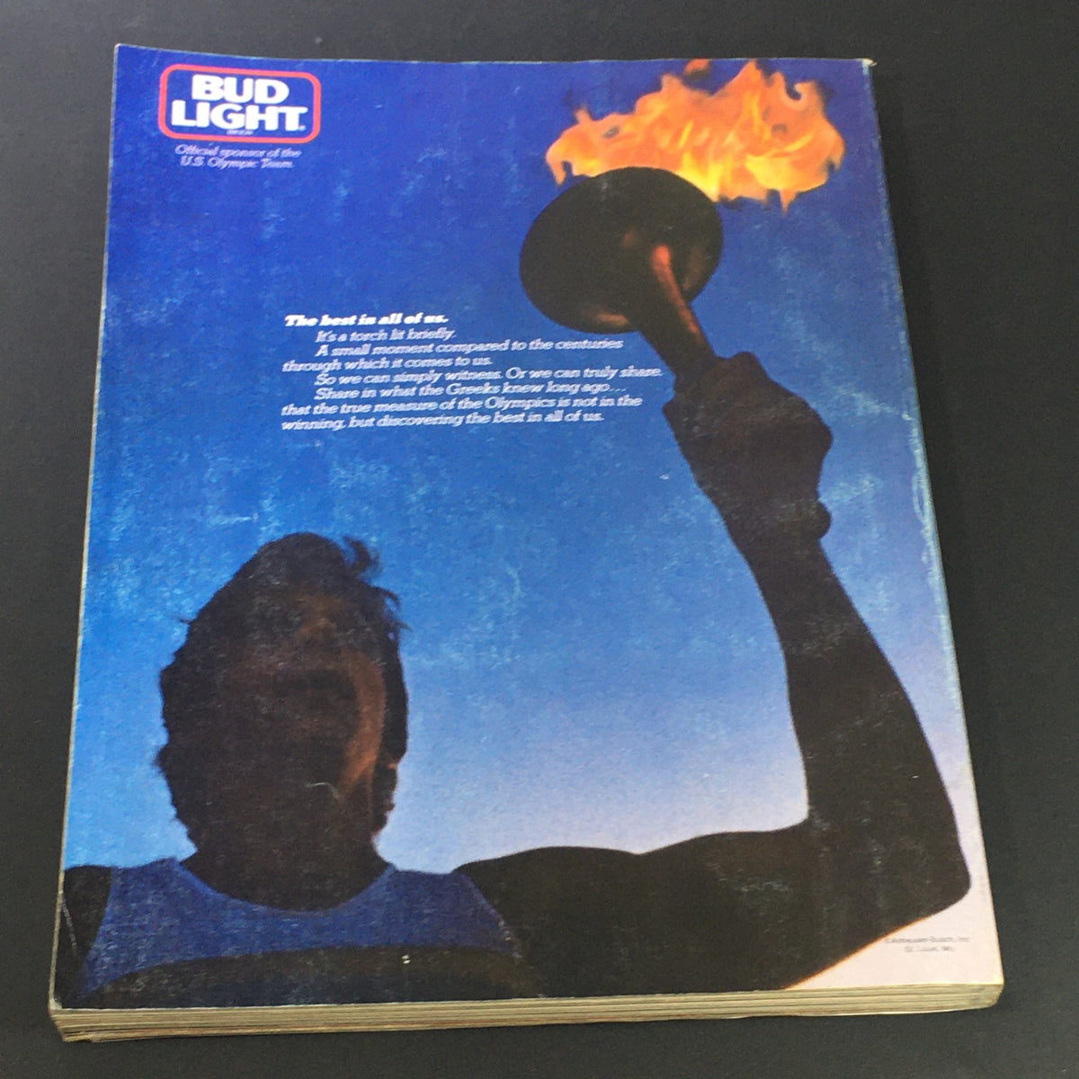 Back cover of Sports Illustrated Magazine July 18 1984 featuring a Bud Light advertisement with an Olympic torch, part of the Special Preview for the Olympics 1984.
