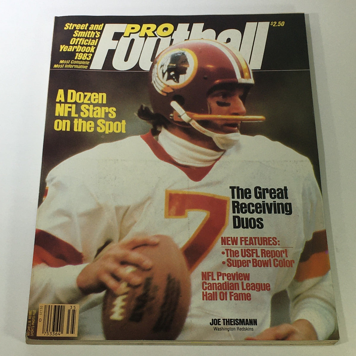 Street & Smith's Official Yearbook Pro Football 1983 featuring Joe Theismann on the cover, showcasing the Washington Redskins quarterback in his iconic uniform, highlighting features of the NFL season and its stars.