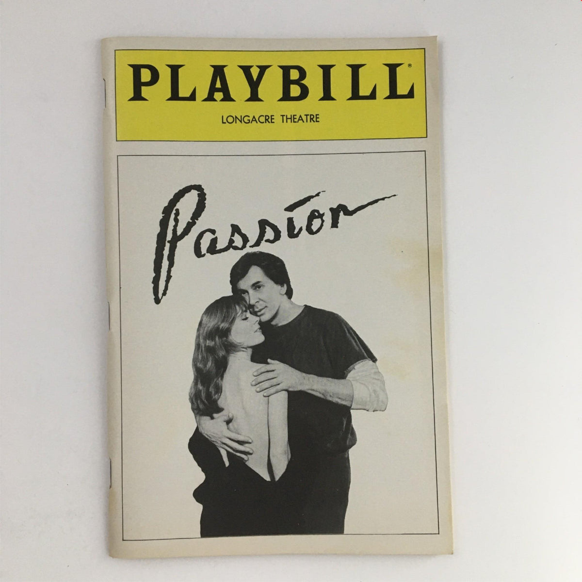 1983 Playbill Longacre Theatre for 'Passion' featuring Frank Langella and a cast member in a romantic pose.