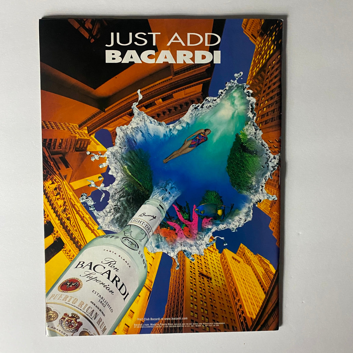 Full-page advertisement for Bacardi rum featured in Sport Magazine March 1997, visually striking design with vibrant colors and imagery.