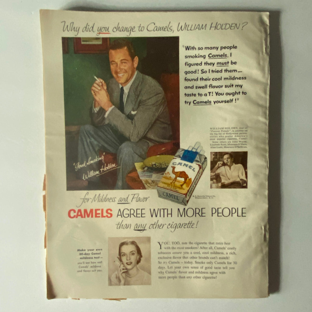 Advertisement featuring William Holden promoting Camels cigarettes, from the VTG Photoplay Magazine March 1954. The ad highlights his endorsement and stylish image, capturing the marketing style of the 1950s.