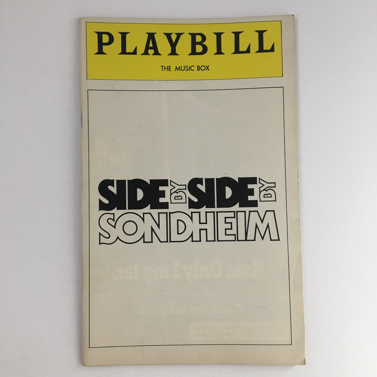 1977 Playbill for 'Side by Side by Sondheim' showcasing the iconic title and details about the production at The Music Box Theatre.