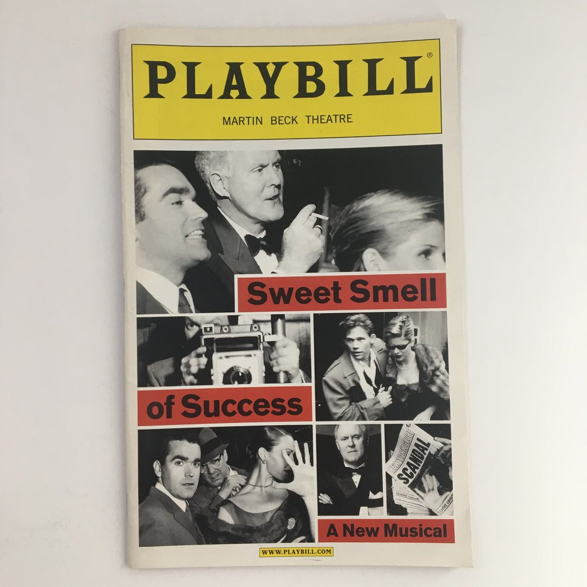 2002 Playbill featuring John Lithgow in Sweet Smell of Success at Martin Beck Theatre, showcasing cast members and production highlights.