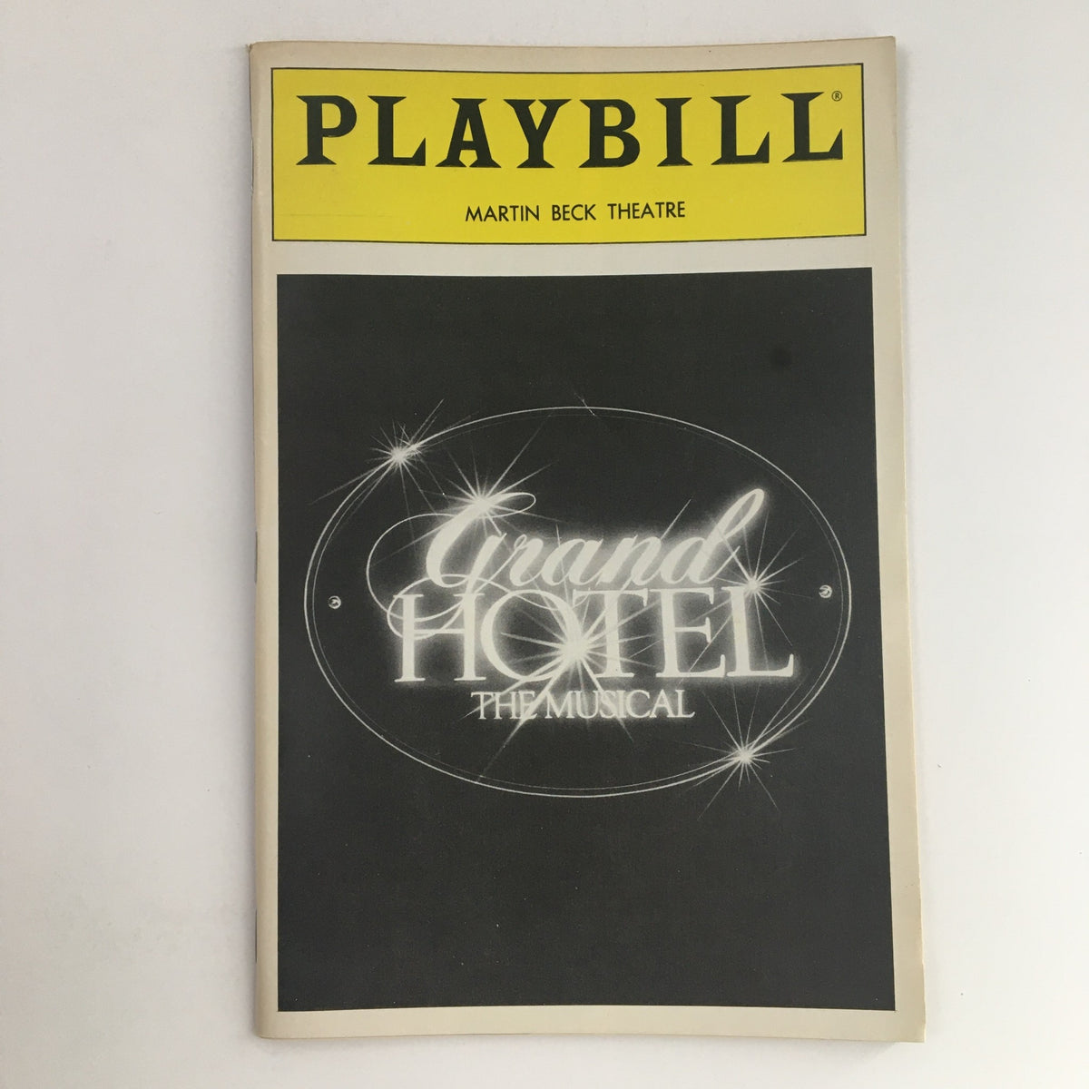 1990 Playbill for Grand Hotel The Musical, showcasing the iconic cover design from the Martin Beck Theatre.