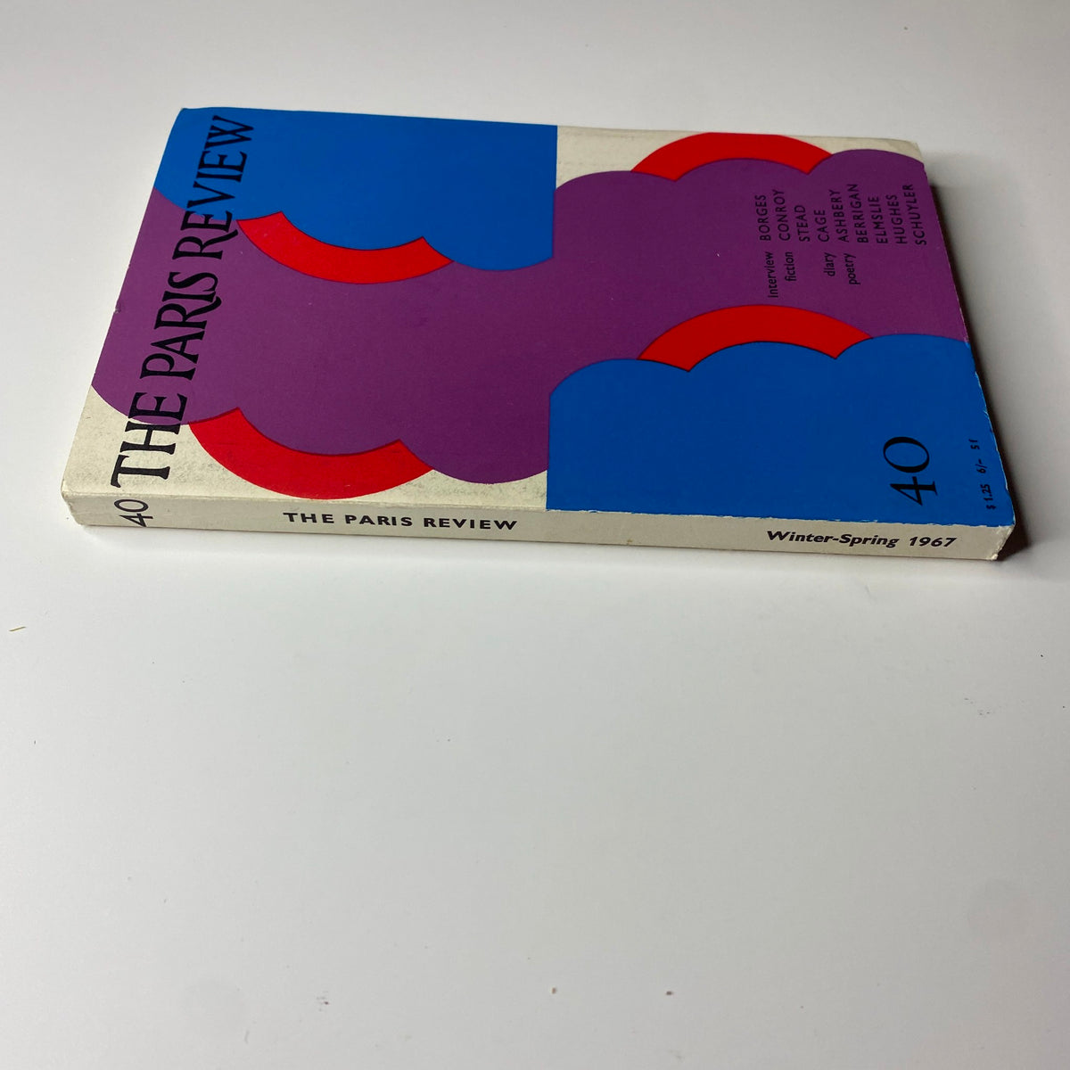 Side view of The Paris Review Magazine, Winter-Spring 1967, No. 40 showcasing its unique design and the title. This issue offers a collection of fiction, poetry, and interviews, emphasizing literary excellence.