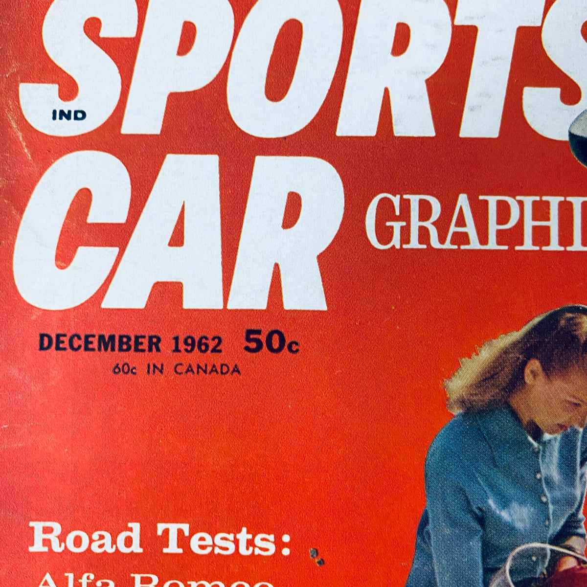 Cover of Sports Car Graphic magazine, December 1962 edition, featuring Alfa Romeo road tests and vintage automotive design.