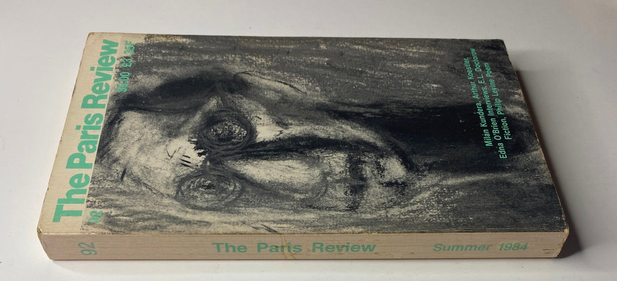 Back cover of The Paris Review Magazine Summer 1984 No. 92, displaying an artistic charcoal drawing and details about the contents including interviews and literary features.