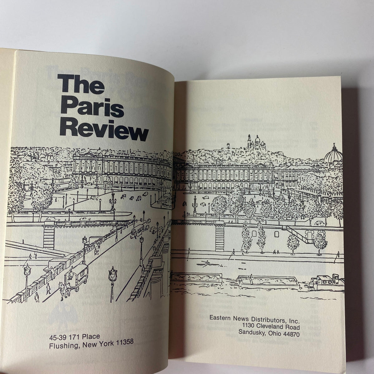Inside page of The Paris Review Magazine Spring 1991 No. 118 displaying the title and scenic illustration of the publication's location.