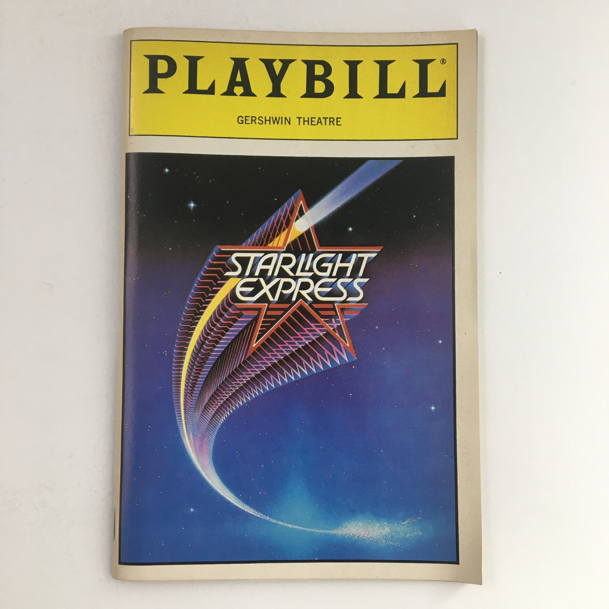 1987 Playbill for Starlight Express at the Gershwin Theatre, featuring a colorful cover with a star and futuristic design.