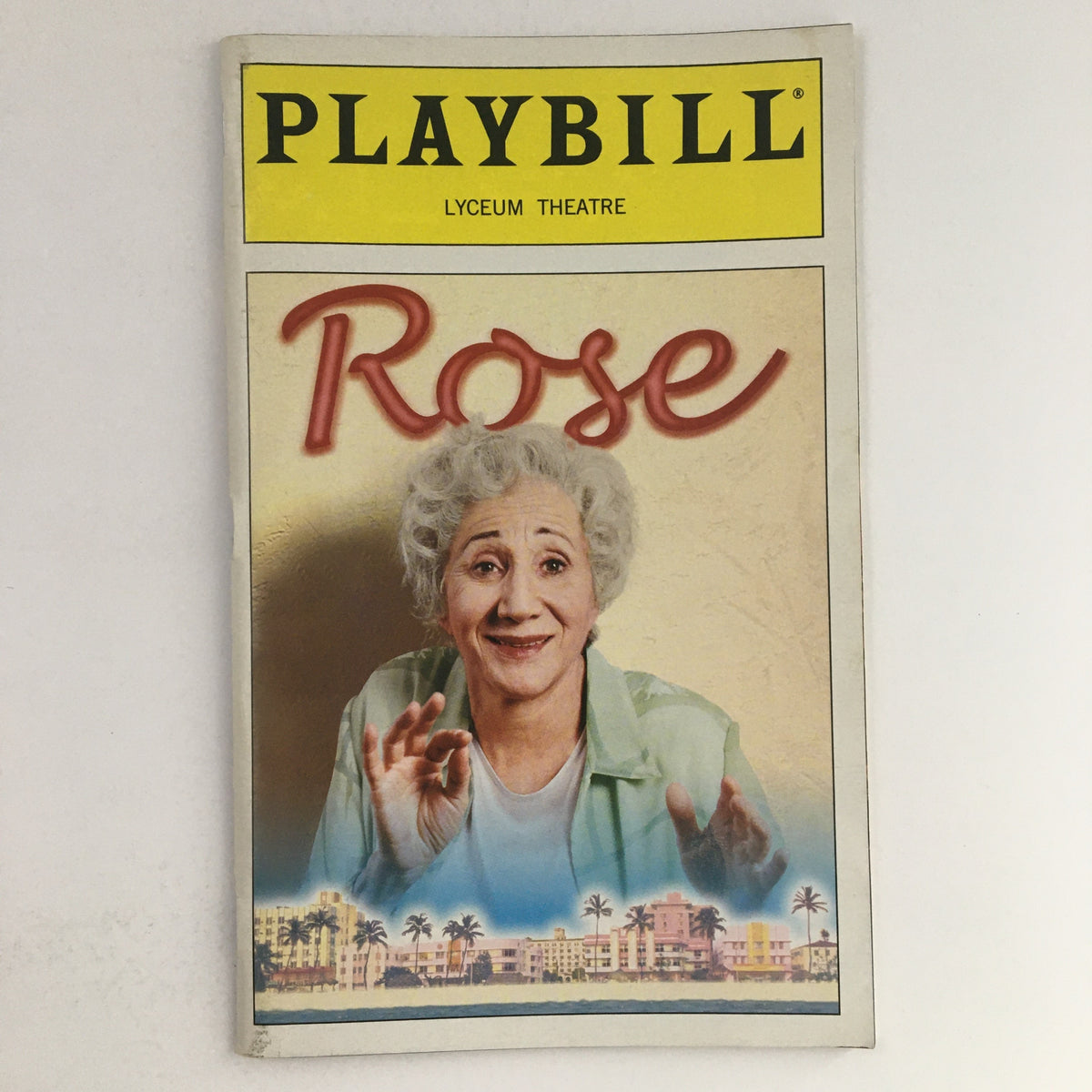 2000 Playbill Lyceum Theatre Present Andre Bishop & Bernard Gersten in Rose featuring the main character with white curly hair and a playful expression.