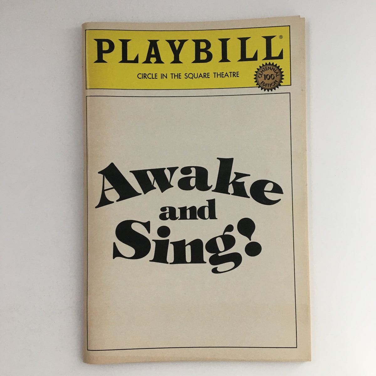 1984 Playbill for Clifford Odets' 'Awake and Sing!' at the Circle In The Square Theatre, showcasing a vintage design.