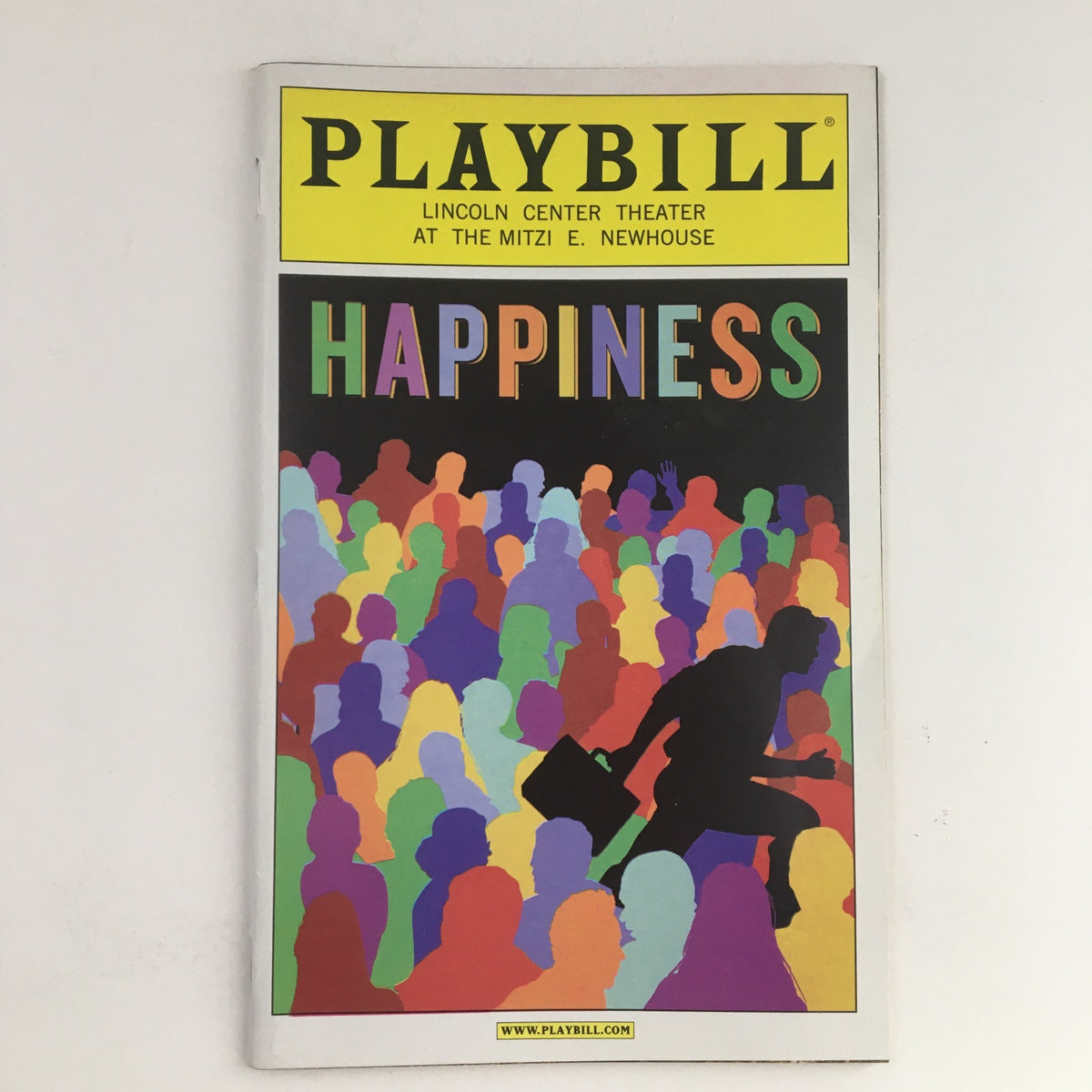 2009 Playbill for 'Happiness: A Musical' at Lincoln Center Theater featuring colorful crowd design on the cover.