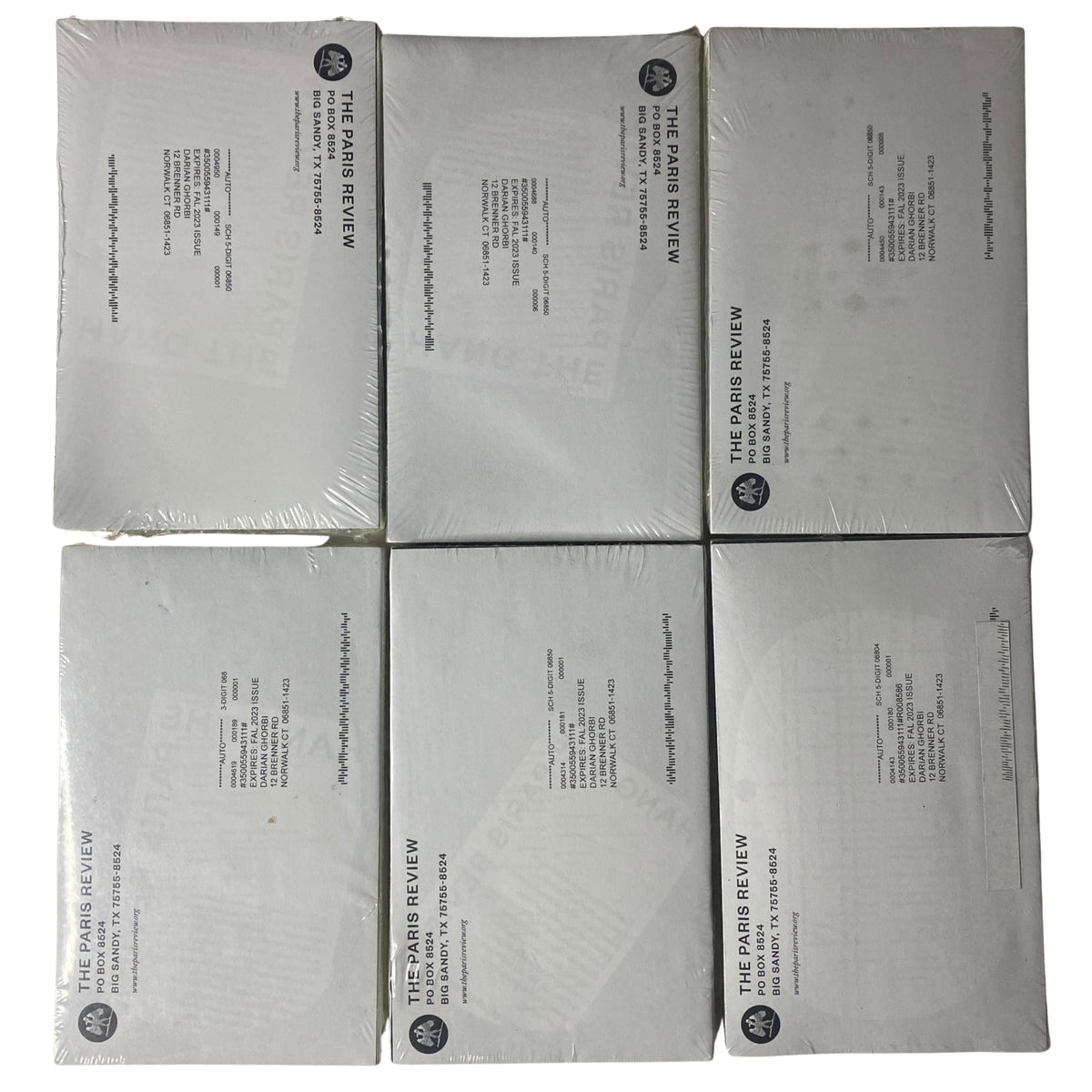 Back view of the six issues of The Paris Review Magazine 2022-2023, sealed and pristine, showcasing the publication's branding.