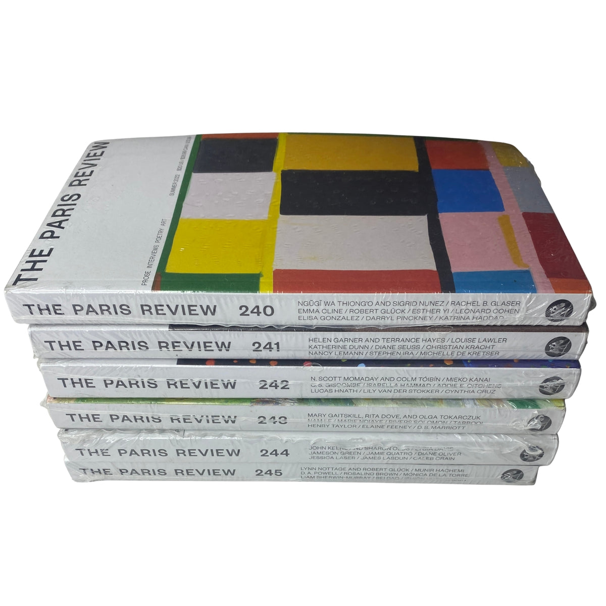 Stacked view of The Paris Review Magazine, including issues 240 to 245 from Summer 2022 to Fall 2023, all in sealed condition.