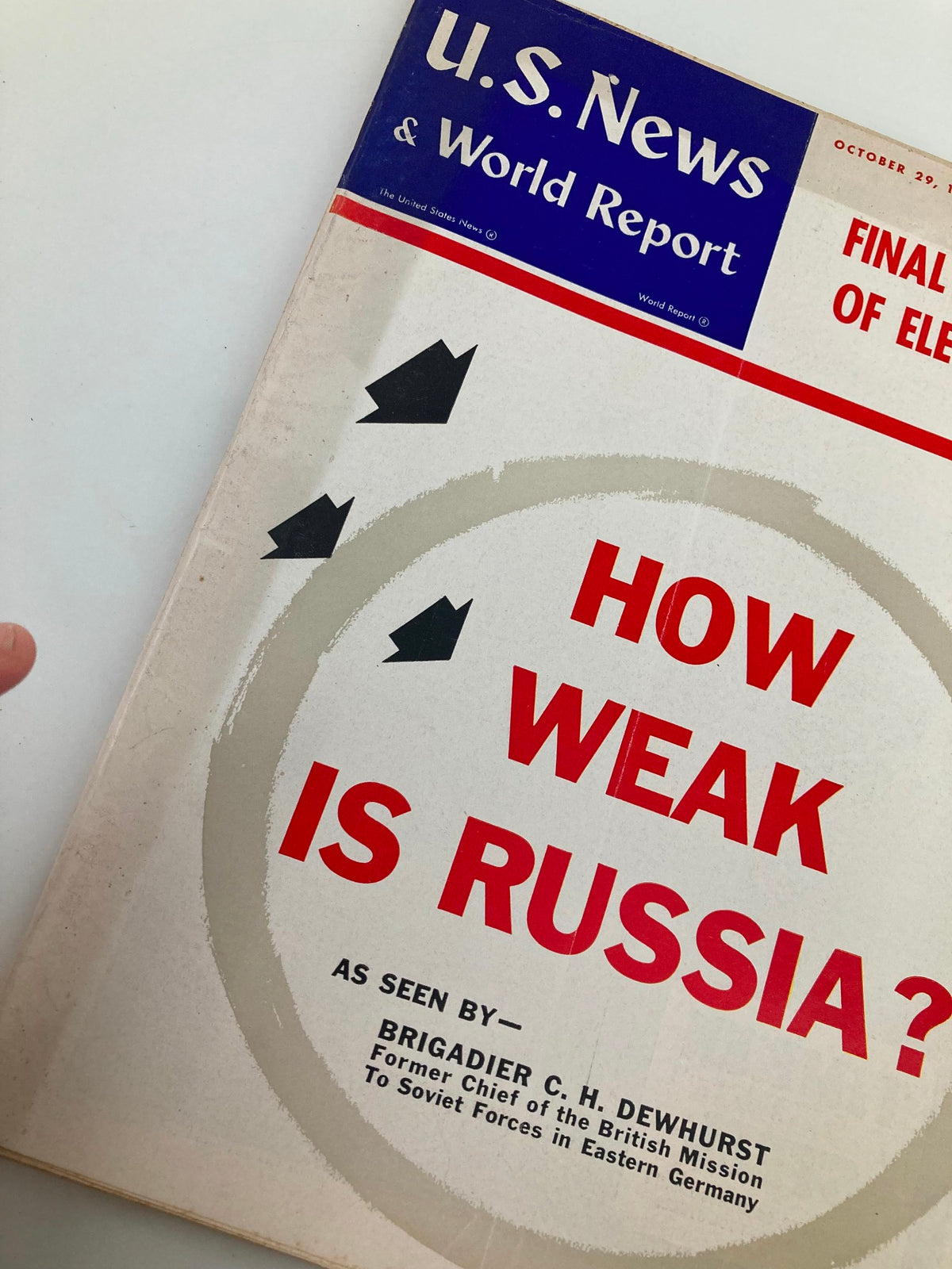 Close-up view of the cover of US News & World Report Magazine, October 29, 1954, displaying the main title 'How Weak is Russia?' and attribution to Brigadier C. H. Dewhurst.