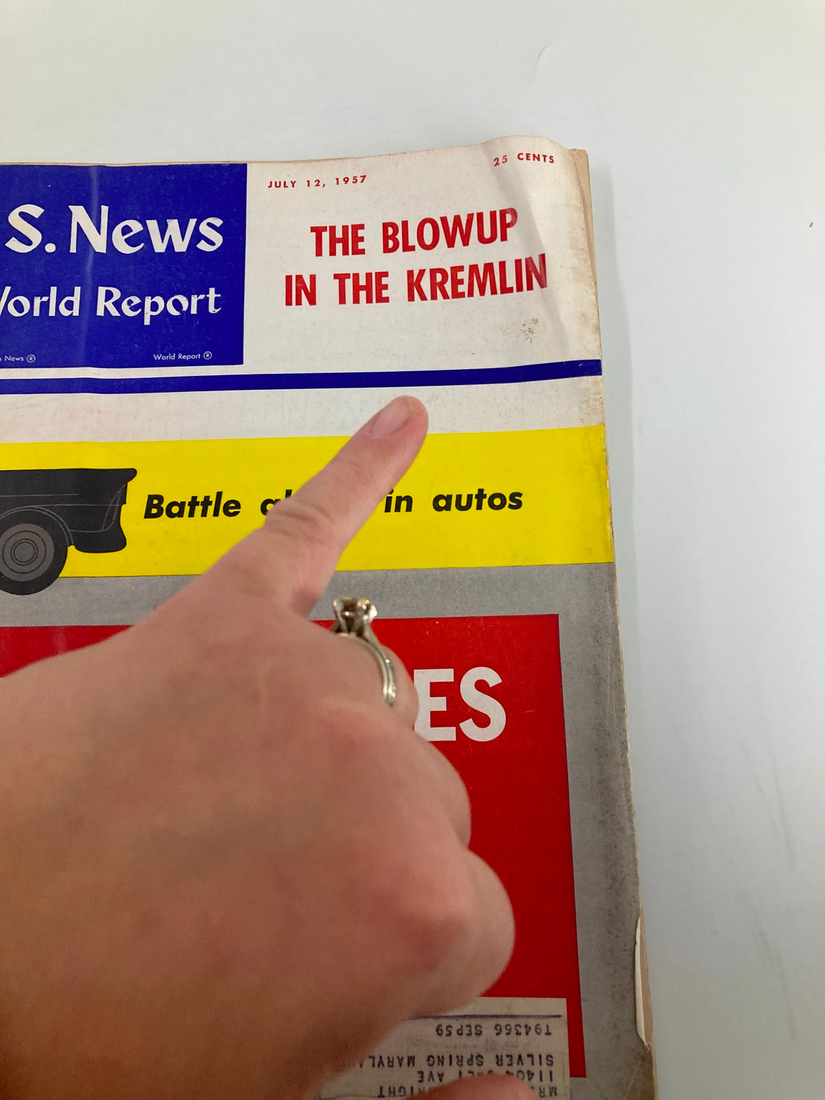 Cover of US News & World Report Magazine from July 12, 1957 featuring the headline 'The Blowup in The Kremlin', with a hand pointing at the title.