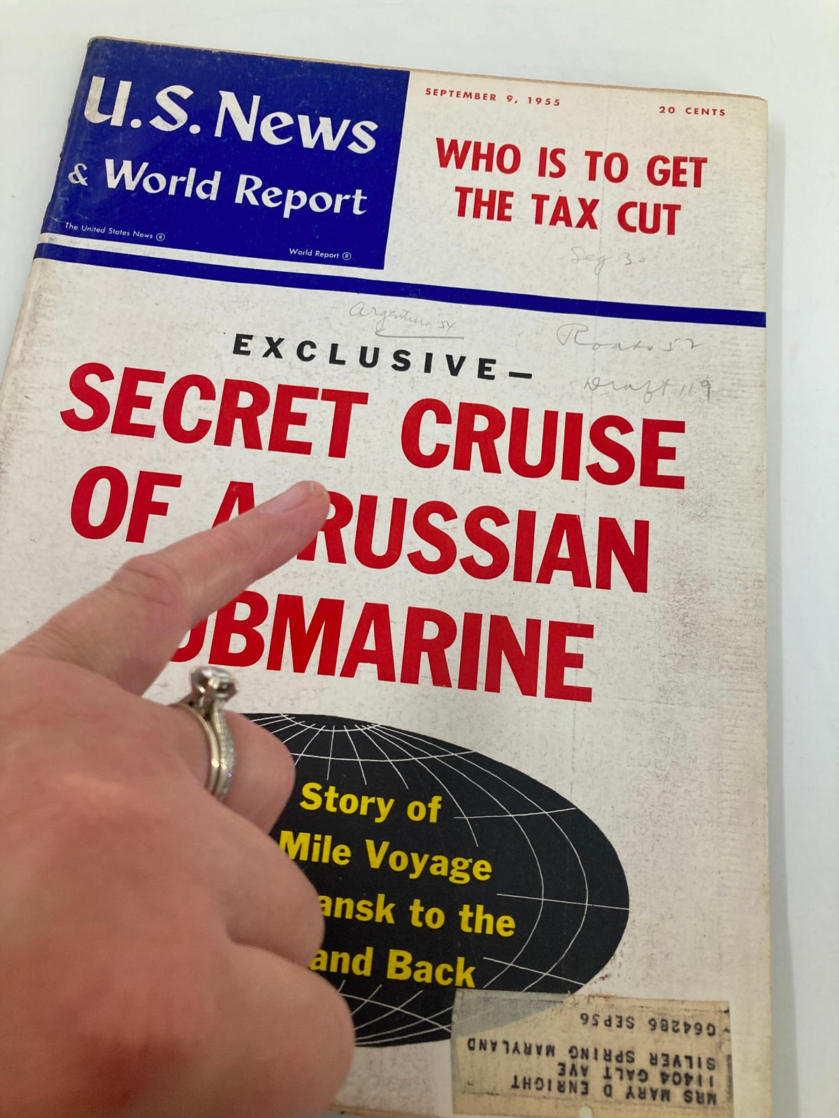 Close-up of the cover of US News & World Report Magazine dated September 9, 1955, highlighting the article 'SECRET CRUISE OF A RUSSIAN SUBMARINE' with details on a significant naval voyage.
