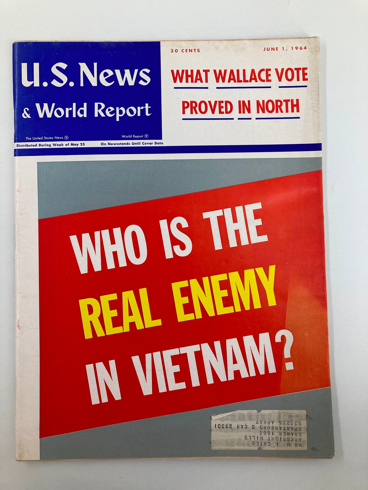 Cover of US News & World Report Magazine from June 1, 1964, featuring the title 'Who Is The Real Enemy in Vietnam?' in bold red and yellow letters, reflecting on the Vietnam War.